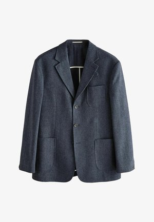 Tumesinine herringbone blazer, mis on valmistatud tekstuurilisest kangast, millel on lõikega krae, kaks esitaskut ja kolm nööpi ees.