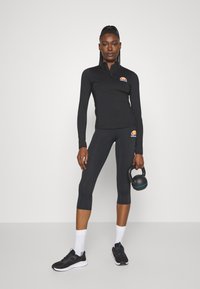 Ellesse SOFIRA 1/4 ZIP - Ilgarankovis viršutinės dalies drabužis - black