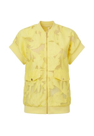 Giacca bomber gialla a maniche corte con sovrapposizione in pizzo floreale, zip frontale, due tasche con pattina e colletto e orlo a coste.