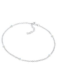 Silverfärgad kedjebraclet med små, multifacetterade kristaller jämnt fördelade. Har en kräftklämma och justerbar längd med extra länkar.