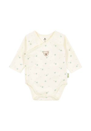 Cremefarbenes Baby-Body mit langen Ärmeln, grünem Blumenmuster und einem kleinen gestickten Teddybärgesicht auf der Brust, mit seitlichen Druckknöpfen.