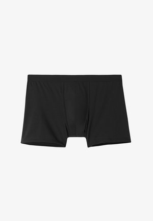Boxers negros hechos de una tela suave. Presentan un saco contorneado y una cinturilla elástica y suave. Sin patrones o acentos visibles.