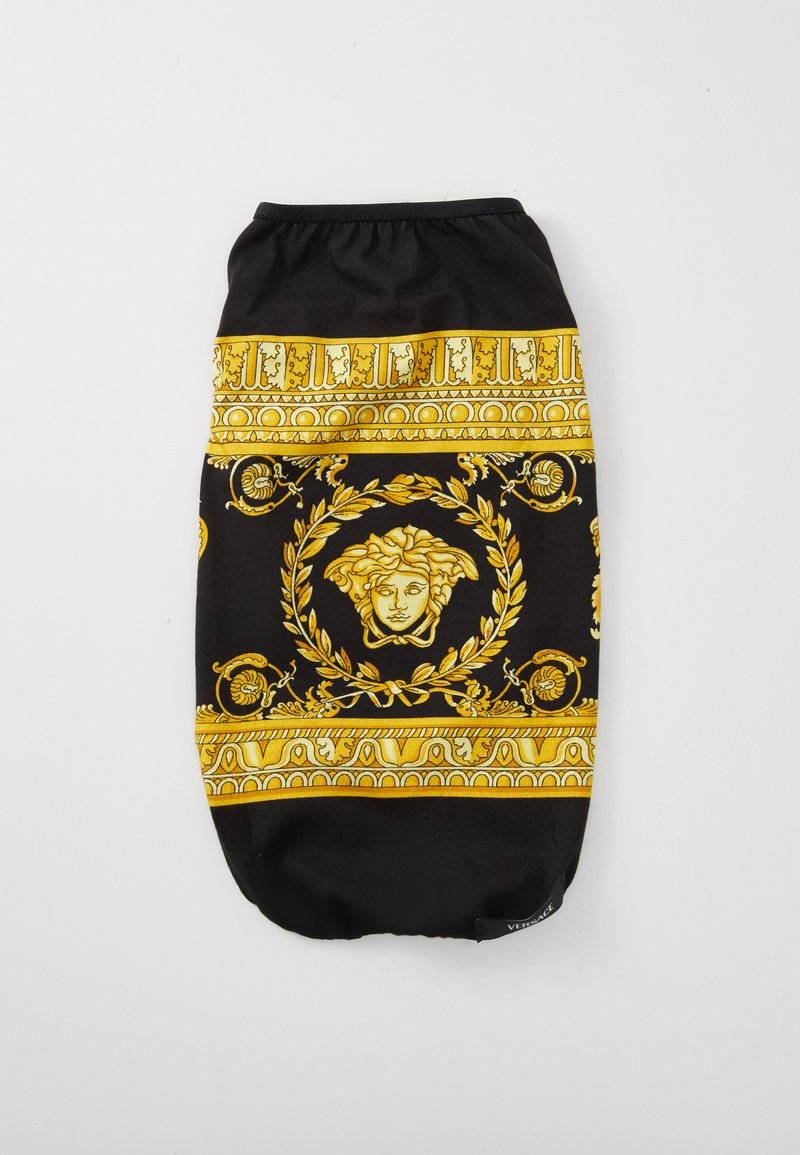 Saco de tecido preto com padrão barroco dourado, apresentando um motivo facial central e bordas decorativas. Textura suave, parte superior elástica.