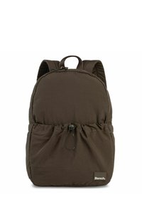 Brown nylon backpack with a rounded shape, drawstring closure at the base, and a logo tag. Features padded shoulder straps and a top handle.