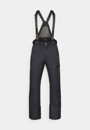 Pantaloni da neve neri con bretelle regolabili, zip frontale e tasche laterali con zip. Presentano un tessuto rinforzato nella parte inferiore delle gambe.