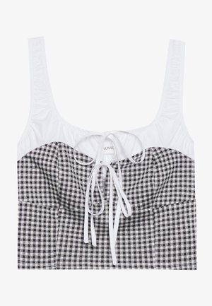 Schwarz-weißer kariertes Crop-Top mit strukturiertem weißen Oberteil, quadratischem Ausschnitt und verstellbarem Band in der Mitte. Verfügt über breite Träger.