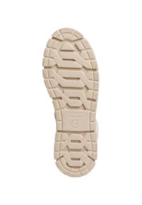 Semelle de chaussure en caoutchouc beige clair présentant un motif de semelle texturé avec de profondes rainures pour l'adhérence et la durabilité. Logo visible sur l'arche.