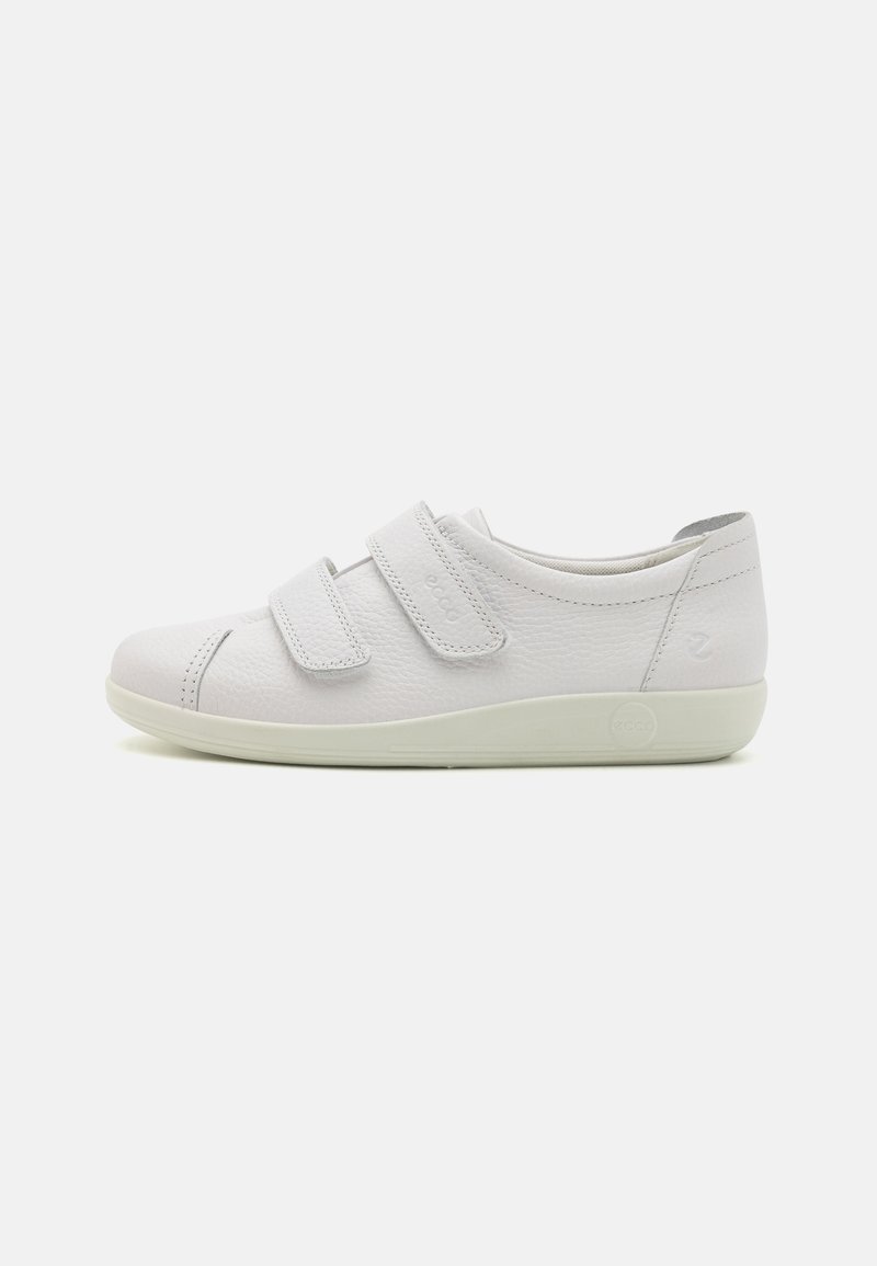 White leather shoes with dual hook-and-loop straps, rounded toe, subtle stitching details, and a cushioned off-white sole.