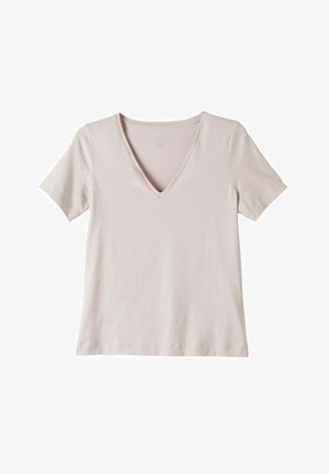 V-ringad t-shirt med kort ärm i ljusbeige, tillverkad av en mjuk bomullsmix. Har en klassisk skärning med en något avslappnad passform.