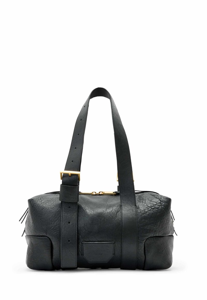 Juoda odinė rankinė su tekstūruotu paviršiumi, puikuojanti auksinės spalvos detalėmis, reguliuojamomis dirželių užsegimais ir šoninėmis užtrauktukais, suteikiančiais papildomą akcentą.