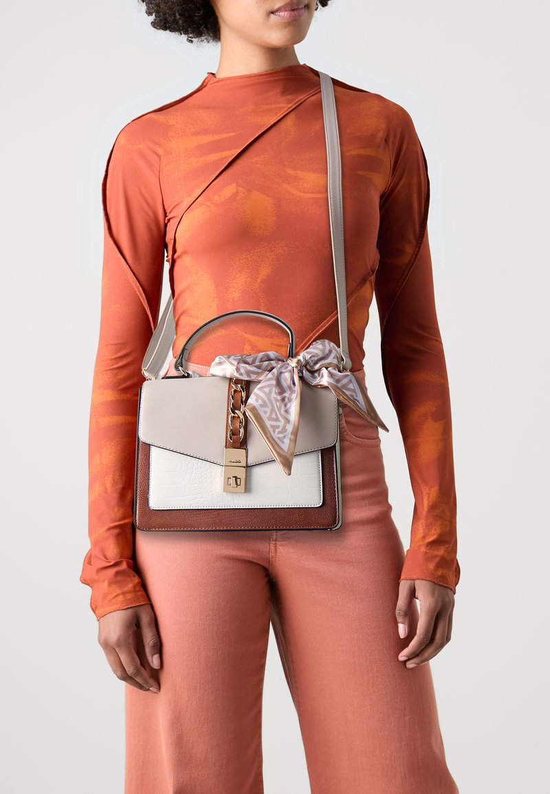 ALDO CAILLA - Bolso de mano - cream