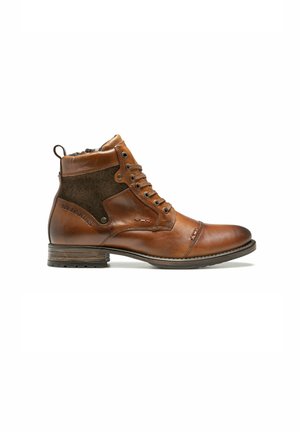 Bottines en cuir brun avec des accents en tissu, à lacets sur le devant, bout rond et semelle texturée. Dotées d'une petite boucle à l'arrière pour un enfilage facile.