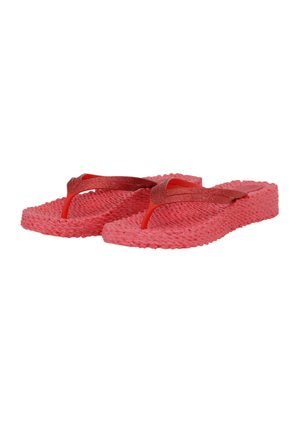 Pair of coral-colored foam flip-flops with textured soles and glittery red Y-shaped straps on a white background.
