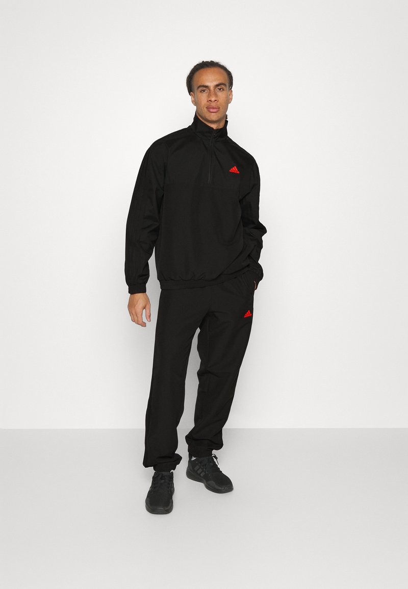 adidas Sportswear M 1/4 ZIP WV TS Tracksuit bottoms black Zalando.ie