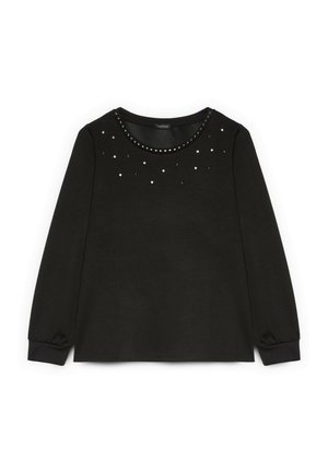 Sort langærmet top med rund halsudskæring prydet med metalliske studs og små rhinsten, lavet af blødt stof med elastiske manchetter.