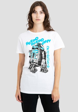 White t-shirt featuring an illustration of a robot in blue and black with the text "Beedo Beedo" and "R2D2." Short sleeves and crew neck design.