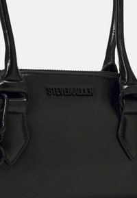 Steve Madden Mala de mão - black