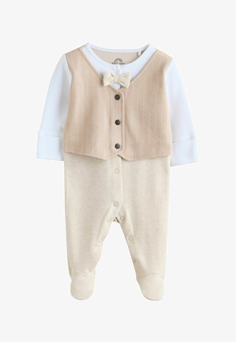 Beiges Baby-Zweiteiler-Outfit mit einer strukturierten Weste mit Knöpfen und Fliege, kombiniert mit einem einfarbigen, weichen Unterteil und mit Füßen versehen.