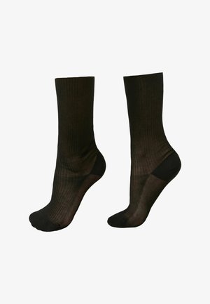 Paar schwarze, halbtransparente, gerippte Sneakersocken mit verstärkten Zehen- und Fersenbereichen, nebeneinander auf weißem Hintergrund dargestellt.