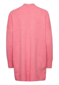 Maglione oversize rosa con scollo rotondo, spalle scese e orlo a coste. Texture morbida con una finitura liscia, senza motivi visibili.