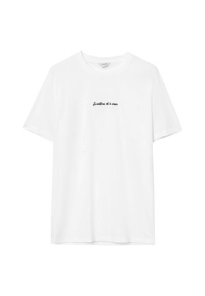 T-shirt bianca in cotone con maniche corte e scollatura rotonda. Testo in stampa corsiva nera nell'area sinistra del petto.