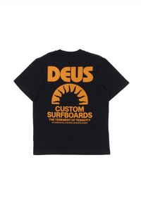 Black cotton T-shirt featuring large orange text, including "DEUS" and "CUSTOM SURFBOARDS," with a sun graphic in the center.