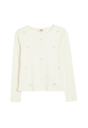 Maglione a maniche lunghe bianco, a coste, con piccole decorazioni a forma di cuore distribuite uniformemente sulla parte anteriore. Collo rotondo, design cropped.