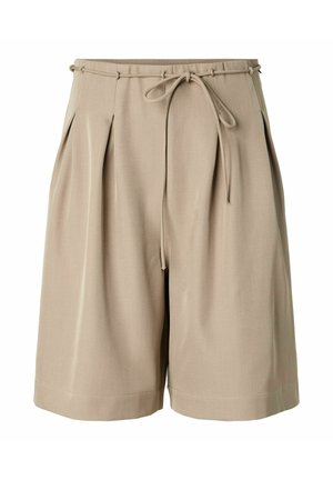 Beežid põlveni ulatuvad lühikesed püksid esipoolsete liistude ning õhukese vööga, mis on vöökohal kikilipsuks seotud.