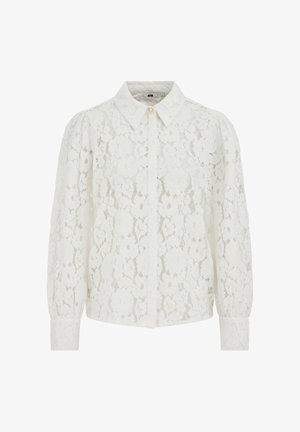 Witte lange mouwen kanten blouse met bloemmotief, puntkraag, knoopmanchetten en een enkele gouden knoop aan de bovenkant vooraan.