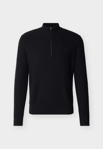 Μαύρο πλεκτό πουλόβερ με μακριά μανίκια, υφή, φερμουάρ στο επάνω μέρος και ριμπ τελειώματα στα μανίκια και στη μέση, απεικονίζεται σε απλό ανοιχτό γκρι φόντο.