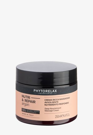 Pot de crème de massage Phytorelax argan Nutri & Repair, 250 ml, couvercle noir, étiquette beige, ingrédients naturels, fabriqué en Italie.