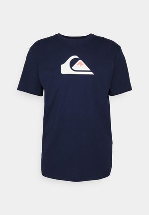 Navy blue cotton t-shirt featuring a large white and coral logo design, round neckline, and short sleeves with a relaxed fit.