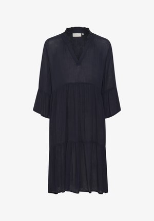 Marineblå, letkjole med V-udskæring og flæsekrave. Har korte klokkeærmer og en lagdelt design. Blød, gennemsigtig tekstur.