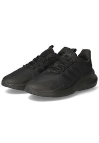 Black athletic shoes featuring a mesh upper, textured patterns, cushioned sole, and three-stripe branding on the sides.