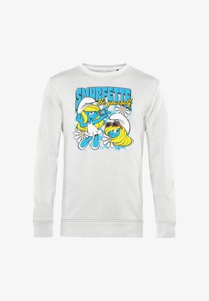 Felpa bianca con due personaggi di Puffetta, uno che tiene un telefono, testo "SMURFETTE Be yourself" e fiori bianchi sullo sfondo.