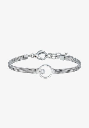 Bracelet en mailles argentées avec un charme circulaire contenant une pierre claire au centre, terminé par un fermoir lobster et une chaîne ajustable.