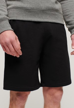 LOGO - Pantaloni sportivi - black