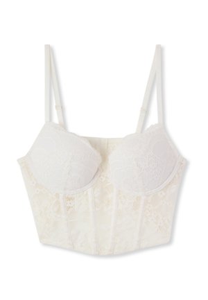 Reggiseno lungo in pizzo bianco con coppe con ferretto e spalline regolabili, caratterizzato da motivi floreali e cuciture strutturate.