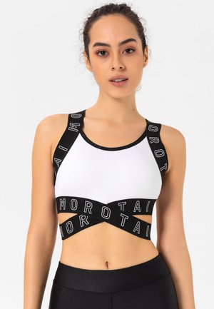 NAKA  - Sports bra - weiß