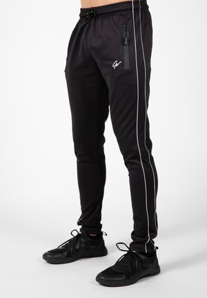 WENDEN - Tracksuit bottoms - black