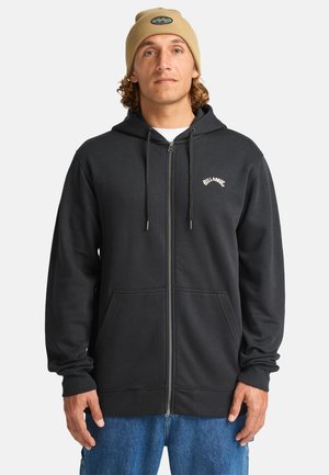 Black zip-up hoodie with drawstrings, two front pockets, ribbed cuffs, and "Billabong" logo printed in white on the left chest.