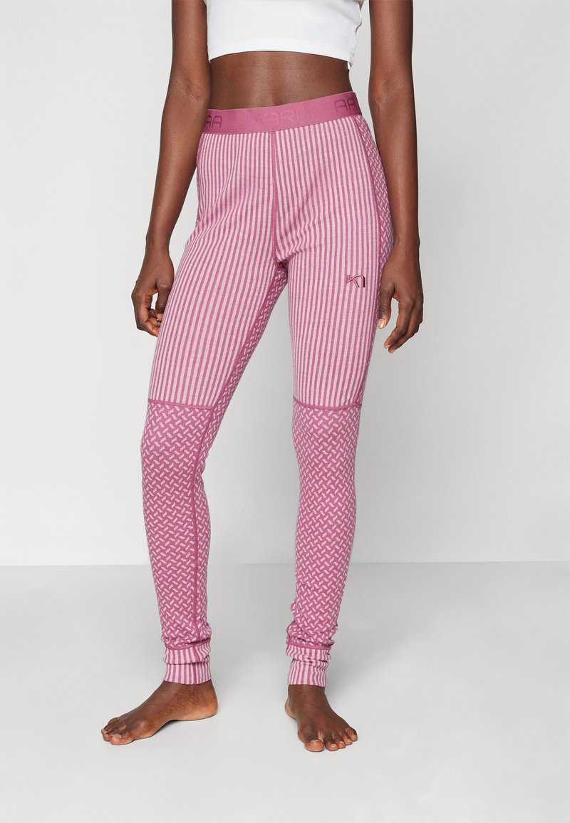 Rózsaszín és fehér csíkos leggings, amely texturált mintázattal, rugalmas derékpánttal és szűkített szárakkal rendelkezik. Puha, rugalmas anyagból készült.