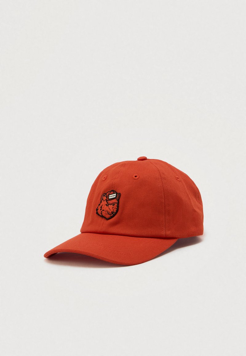 Orange cotton cap with embroidered bear design on the front. Features a curved brim and adjustable strap at the back.