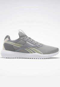 Chaussure de course Reebok grise à lacets avec semelle blanche texturée et bandes latérales beige clair sur fond uni.