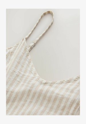 Beige and white striped camisole top with thin straps, made from lightweight fabric. Features a scooped neckline and soft texture.