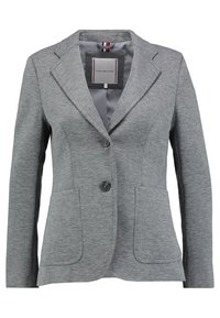 Blazer grigio con tessuto strutturato, design monopetto, due tasche frontali e due bottoni con una sottile lucentezza. Interno con etichetta logo.