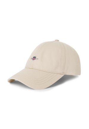 Beige honkbalpet met een gebogen klep, gemaakt van zacht stof. Beschikt over een geborduurd logo aan de voorkant. Verstelbare strap aan de achterkant voor een goede pasvorm.