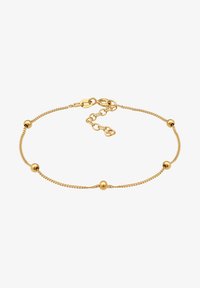 Atlasīts, gold-coloured