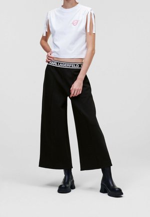 Spodnie materiałowe