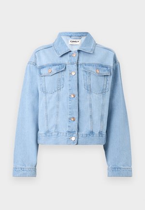 Hele sinine denimpusa, millel on krae, nupulukk ja kaks rinna-taskut. Omab pikki varrukaid ja lühikest hemmi.